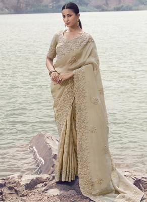 Beige zari weaving heavy embroidered wedding saree 1