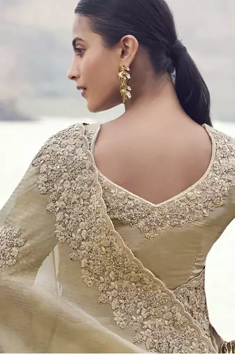 Beige zari weaving heavy embroidered wedding saree