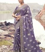 Purple zari weaving heavy embroidered wedding saree