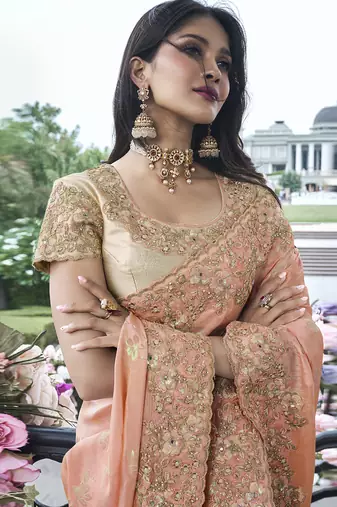 Peach silk heavy embroidered wedding saree