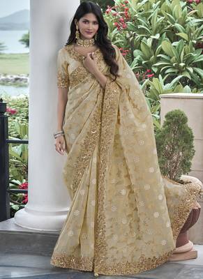 Cream silk heavy embroidered wedding saree 1