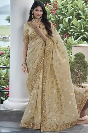 Cream silk heavy embroidered wedding saree