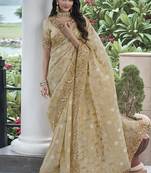 Cream silk heavy embroidered wedding saree