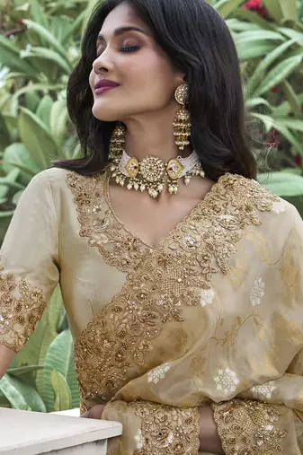 Cream silk heavy embroidered wedding saree
