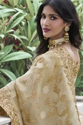 Cream silk heavy embroidered wedding saree