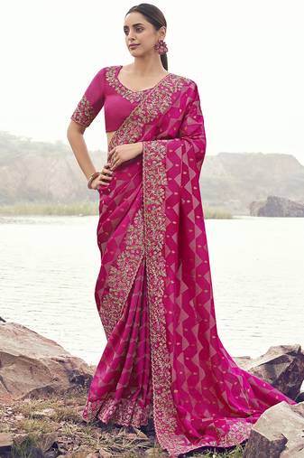Rani-pink zari weaving heavy embroidered wedding saree