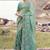 Light-green ndturquoise zari weaving heavy embroidered wedding saree
