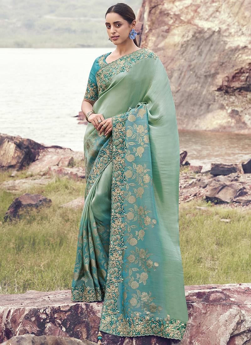 Light-green ndturquoise zari weaving heavy embroidered wedding saree
