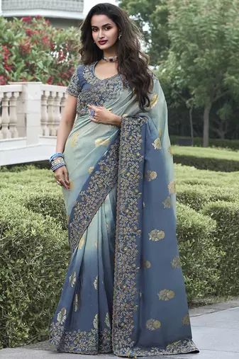 Grey and bottel green silk heavy embroidered wedding saree