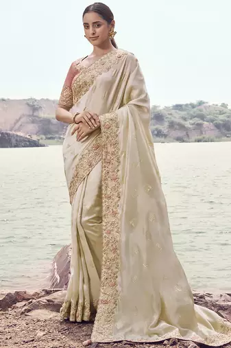 Cream zari weaving heavy embroidered wedding saree