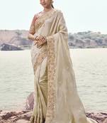 Cream zari weaving heavy embroidered wedding saree