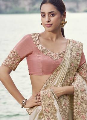Cream zari weaving heavy embroidered wedding saree 2
