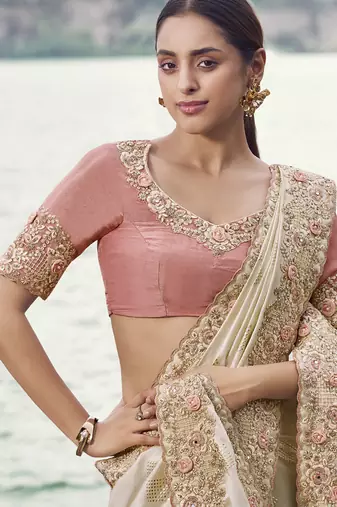 Cream zari weaving heavy embroidered wedding saree