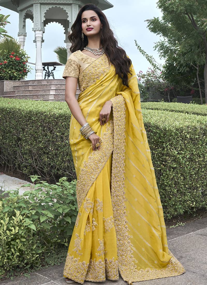 Yellow silk heavy embroidered wedding saree
