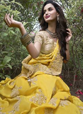 Yellow silk heavy embroidered wedding saree 2