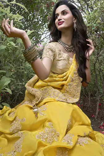 Yellow silk heavy embroidered wedding saree