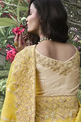 Yellow silk heavy embroidered wedding saree