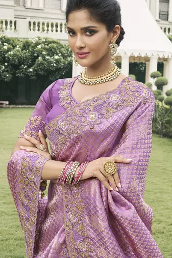 Purple silk heavy embroidered wedding saree