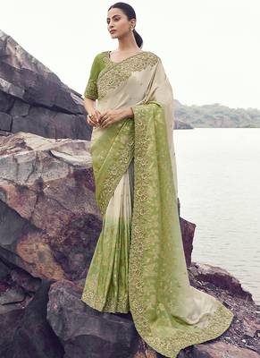 Off white nd light green zari weaving heavy embroidered wedding saree 1