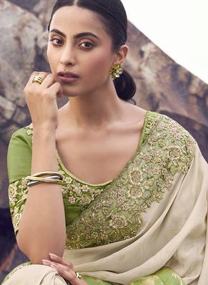 Off white nd light green zari weaving heavy embroidered wedding saree 2