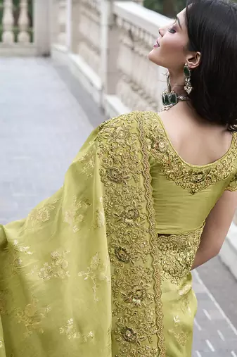 Parrot-green silk heavy embroidered wedding saree