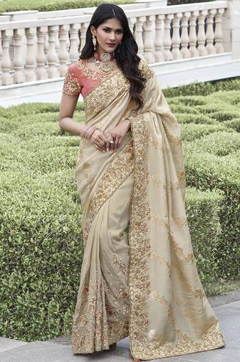 Cream silk heavy embroidered wedding saree