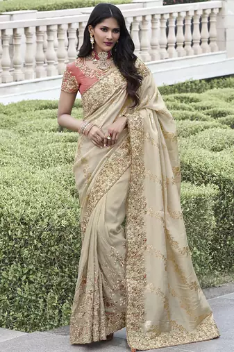 Cream silk heavy embroidered wedding saree