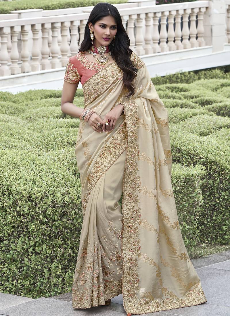 Cream silk heavy embroidered wedding saree