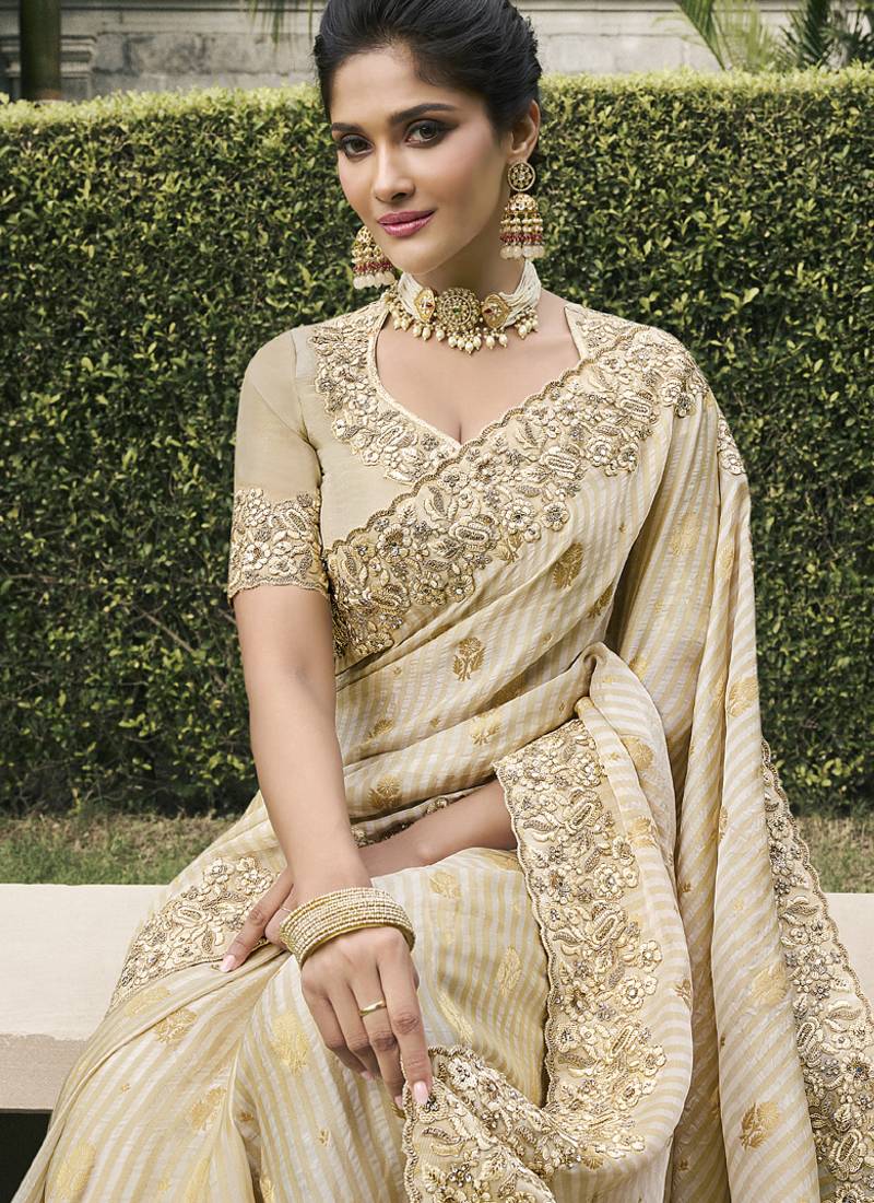 Cream silk heavy embroidered wedding saree