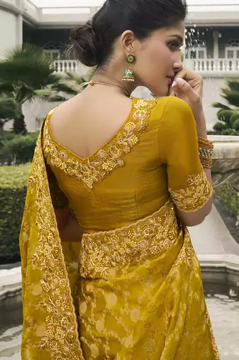 Gold silk heavy embroidered wedding saree