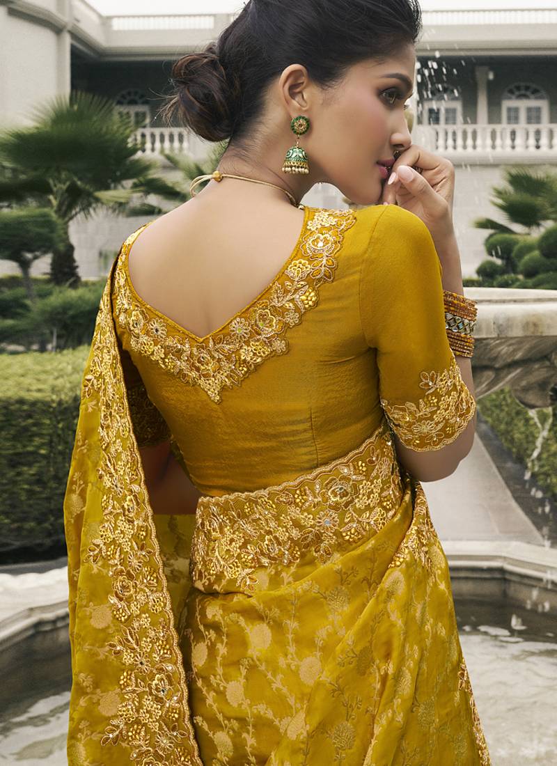 Gold silk heavy embroidered wedding saree