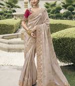 Beige silk heavy embroidered wedding saree