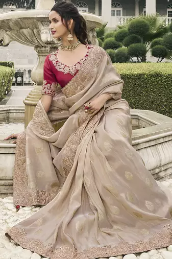 Beige silk heavy embroidered wedding saree