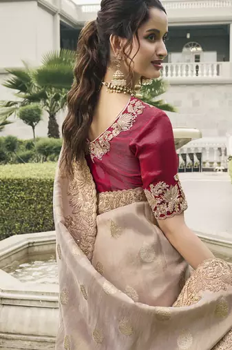 Beige silk heavy embroidered wedding saree
