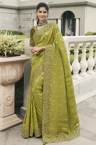 Green silk heavy embroidered wedding saree