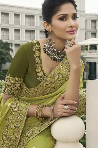 Green silk heavy embroidered wedding saree