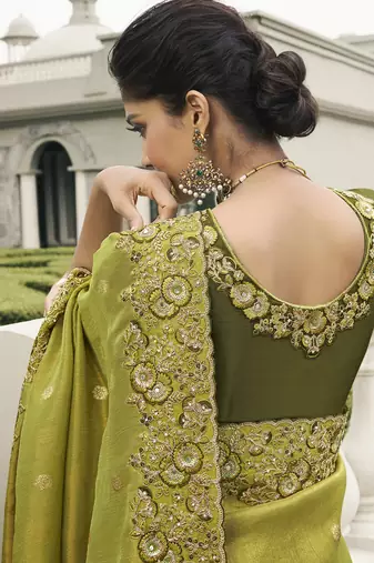 Green silk heavy embroidered wedding saree