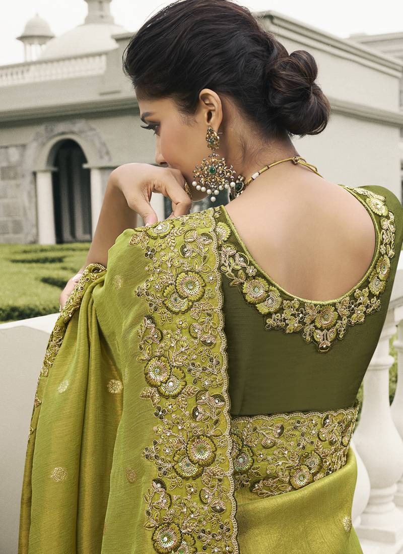 Green silk heavy embroidered wedding saree