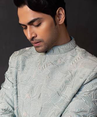 Ice blue embroidered linen satin bandhgala and pant 2