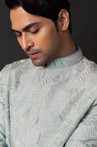 Ice blue embroidered linen satin bandhgala and pant