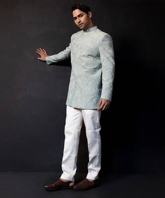 Ice blue embroidered linen satin bandhgala and pant 3
