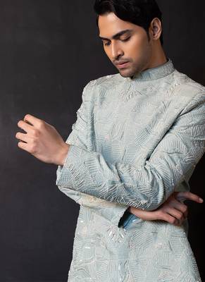 Ice blue embroidered linen satin bandhgala and pant 4
