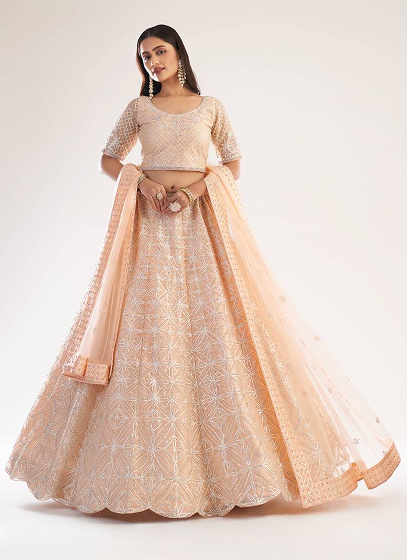 Peach Wedding Wear Embellished Heavy Butterfly Net Lehenga Choli