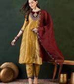 Gold ethnic motifs embroidered thread work a-line kurta with trousers and dupatta