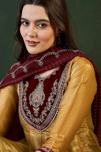 Gold ethnic motifs embroidered thread work a-line kurta with trousers and dupatta