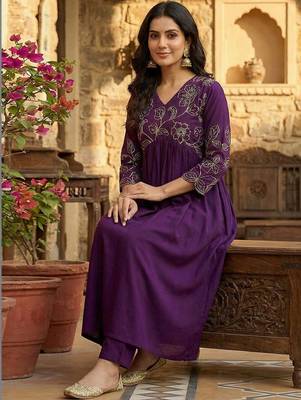 Women floral embroidered pleated sequinned kurta with palazzos 5