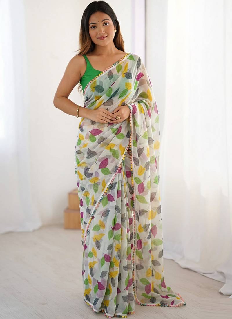 Green heavy chiffon lace border saree with blouse