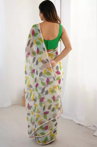 Green heavy chiffon lace border saree with blouse