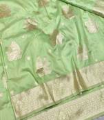 Light green zari woven baluchari silk traditional saree with blouse piece