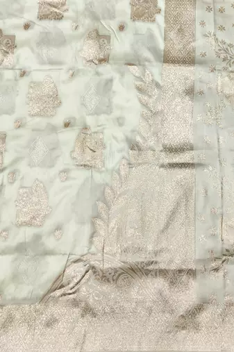 Cream zari woven baluchari silk traditional saree with blouse piece
